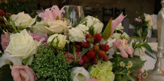 006: Local Italian flowers, foraging for mushrooms, and more! An arrangement of local Italian flowers on a table.