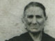 009: Italian ancestry and discovering your heritage A woman of Italian ancestry captured in a black and white photograph, exploring her heritage.