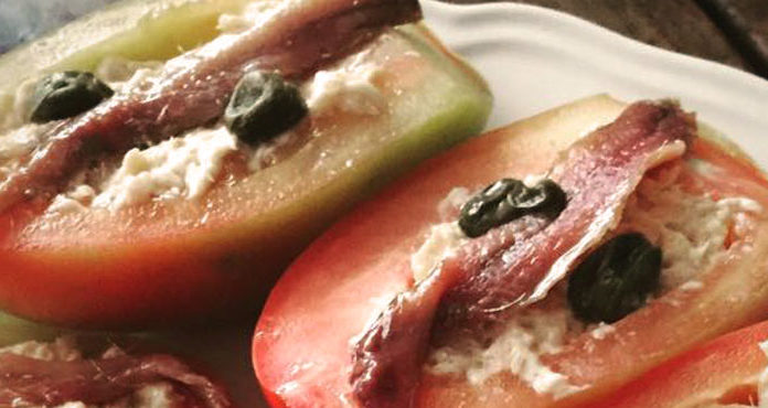 016: Summer in Italy — beating the heat and our favorite no-cook recipes No-cook recipe of stuffed tomatoes with olives and capers, perfect for beating the heat during a Summer in Italy.